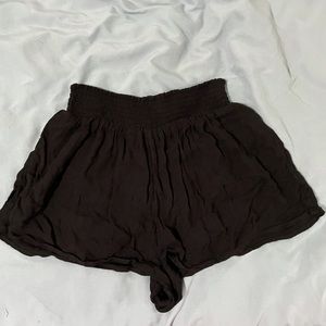 Black flowy urban outfitters out from under shorts